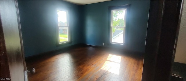 1134 E Main St, Coshocton, OH 43812 - spare room featuring hardwood / wood-style flooring