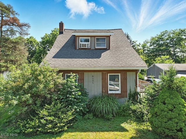 8505 Olde 8 Rd, Northfield Center, OH 44067 - bungalow with a chimney and a shingled roof