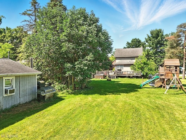 8505 Olde 8 Rd, Northfield Center, OH 44067 - view of green lawn featuring a playground, a wooden deck, and cooling unit