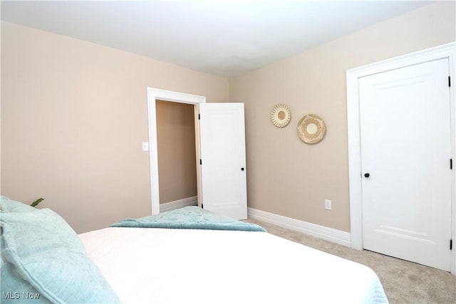 1120 Delia Ave, Akron, OH 44320 - bedroom with light colored carpet and baseboards
