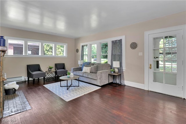 1120 Delia Ave, Akron, OH 44320 - living area featuring dark wood-type flooring and baseboard heating