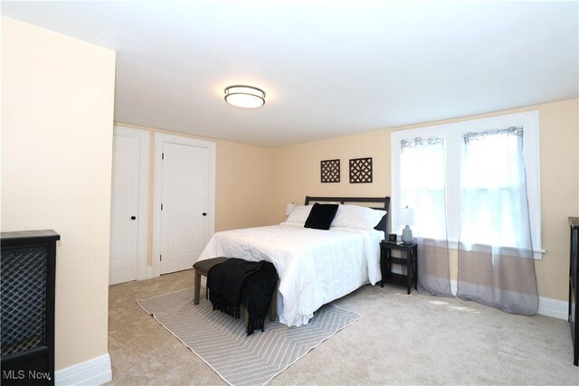 1120 Delia Ave, Akron, OH 44320 - carpeted bedroom with baseboards