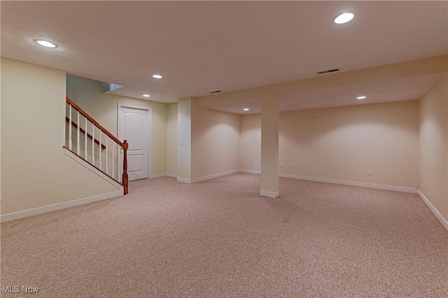 4837 Arbour Green Dr, Bath, OH 44333 - finished basement with recessed lighting, light colored carpet, and stairs