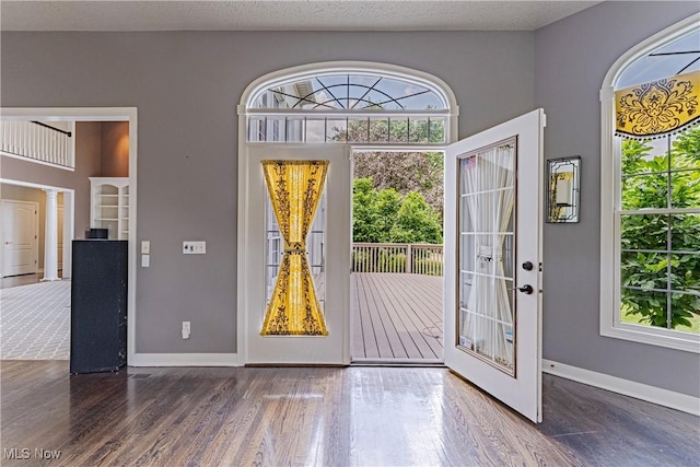 4837 Arbour Green Dr, Bath, OH 44333 - foyer entrance featuring wood finished floors and decorative columns