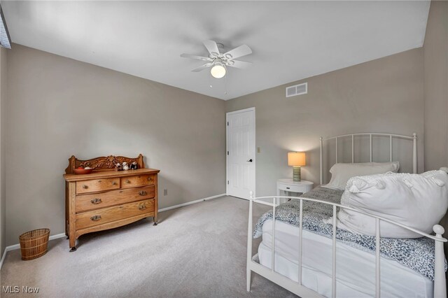 561 Willard Rd, Aurora, OH 44202 - carpeted bedroom featuring baseboards and a ceiling fan