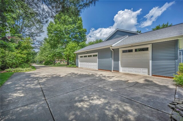 561 Willard Rd, Aurora, OH 44202 - garage featuring driveway