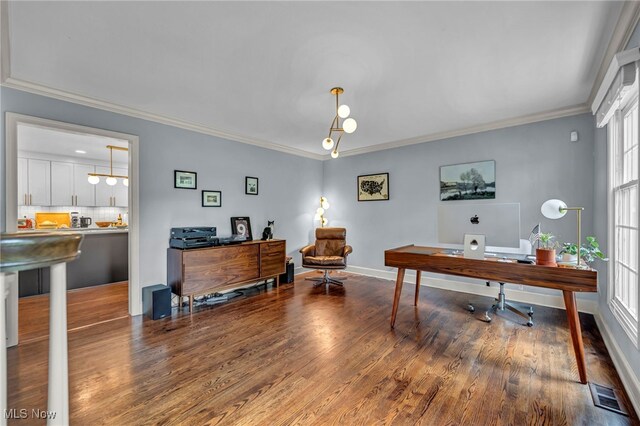561 Willard Rd, Aurora, OH 44202 - office area featuring wood finished floors and crown molding