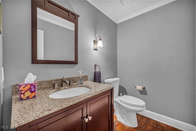 561 Willard Rd, Aurora, OH 44202 - bathroom featuring crown molding, wood finished floors, and vanity