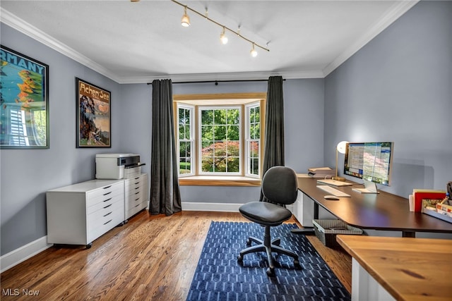 561 Willard Rd, Aurora, OH 44202 - home office featuring wood finished floors, plenty of natural light, track lighting, and ornamental molding
