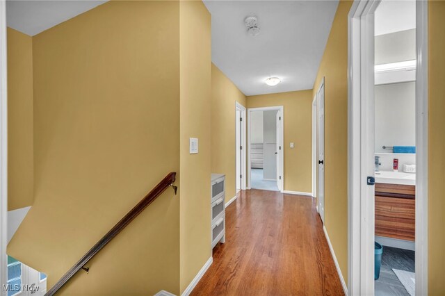 561 Willard Rd, Aurora, OH 44202 - hall with an upstairs landing and wood finished floors