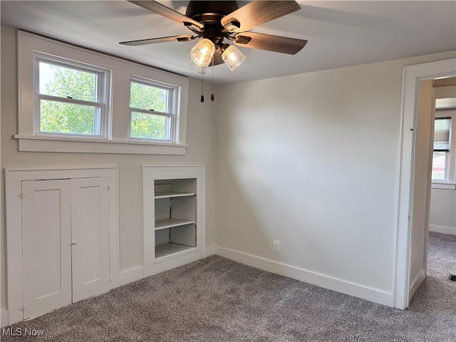 114 Hillcrest St, Ravenna, OH 44266 - carpeted empty room featuring baseboards and ceiling fan
