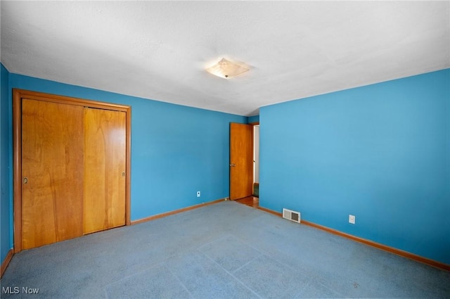 28030 Coolidge Dr, Euclid, OH 44132 - unfurnished bedroom featuring carpet flooring and a closet
