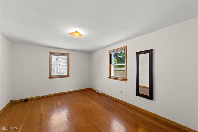 4038 Wandsworth Rd, South Euclid, OH 44121 - unfurnished room featuring wood finished floors and baseboards