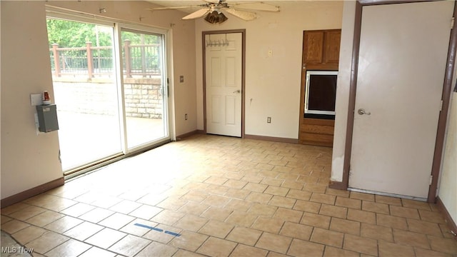 1519 Mctaggart Rd, Stow, OH 44224 - spare room with a ceiling fan and baseboards