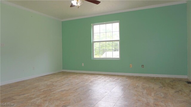 1519 Mctaggart Rd, Stow, OH 44224 - unfurnished room with ceiling fan and ornamental molding