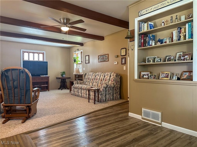 30 Bond St, Niles, OH 44446 - living area featuring ceiling fan, wood finished floors, and beam ceiling