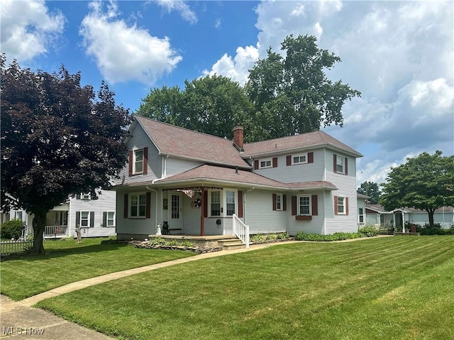 30 Bond St, Niles, OH 44446 - view of front of property with covered porch, a front lawn, and a chimney