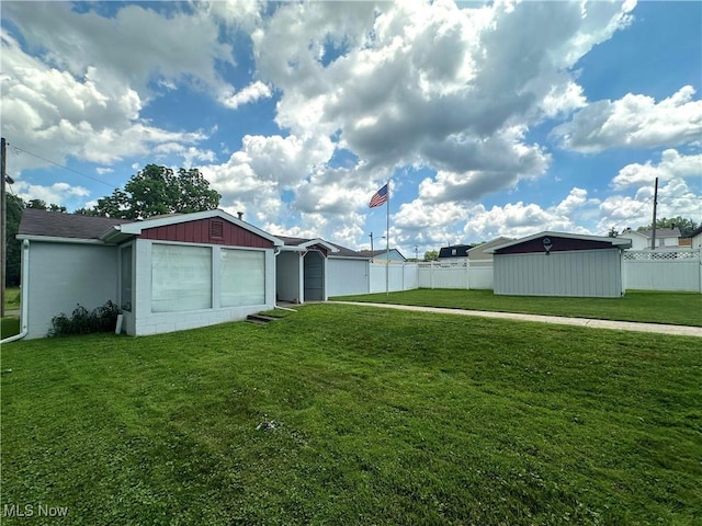 30 Bond St, Niles, OH 44446 - view of yard with an outdoor structure and an attached garage
