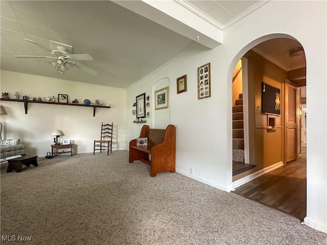 30 Bond St, Niles, OH 44446 - sitting room featuring a ceiling fan, carpet flooring, ornamental molding, and arched walkways