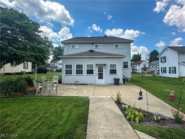 30 Bond St, Niles, OH 44446 - back of property with a patio and a lawn