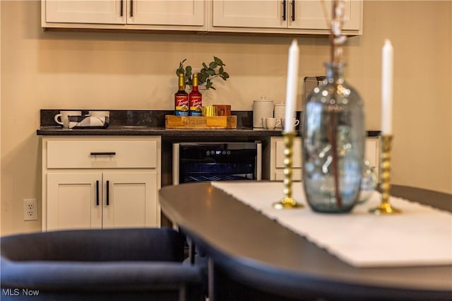 30529 Ridge Rd, Wickliffe, OH 44092 - kitchen with wine cooler and white cabinets