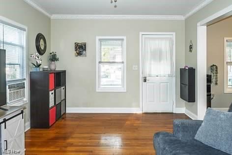 522 Lamont St, Akron, OH 44305 - living room featuring crown molding, dark wood-style flooring, and healthy amount of natural light