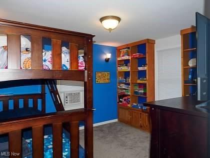 522 Lamont St, Akron, OH 44305 - carpeted bedroom with baseboards