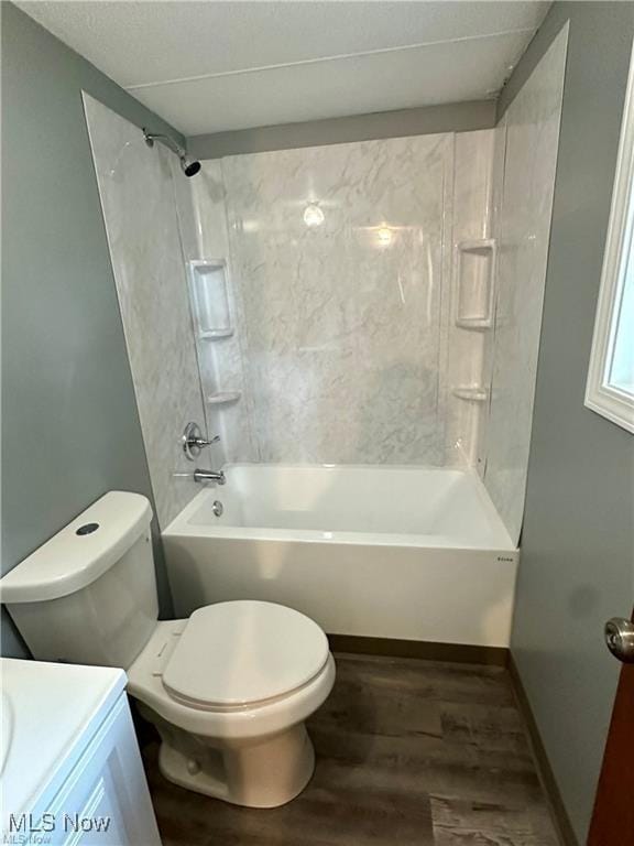 7443 Spillway Rd Unit 63, Lisbon, OH 44432 - bathroom featuring wood finished floors, vanity, and washtub / shower combination