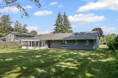 6265 Thunderbird Dr, Mentor, OH 44060 - rear view of property featuring a sunroom