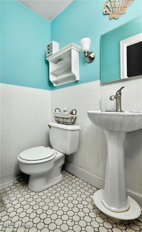 120 N Middle St, Columbiana, OH 44408 - half bath with tile walls and wainscoting