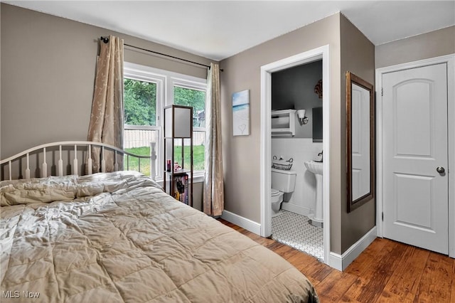 120 N Middle St, Columbiana, OH 44408 - bedroom with wood finished floors and connected bathroom