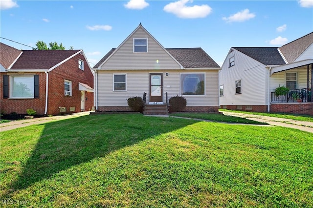 841 E 216th St, Euclid, OH 44119 - bungalow-style house featuring entry steps and a front lawn