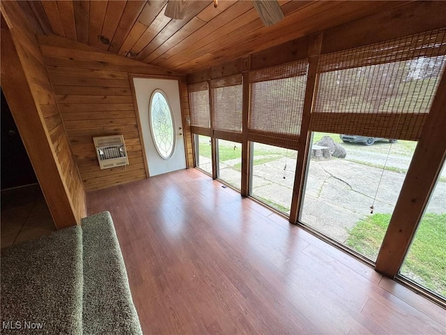 33 Knight Ln, Big Bend, WV 26136 - unfurnished sunroom featuring heating unit, vaulted ceiling, and healthy amount of natural light