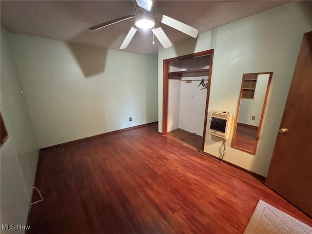33 Knight Ln, Big Bend, WV 26136 - unfurnished bedroom with heating unit, wood finished floors, a ceiling fan, and a closet