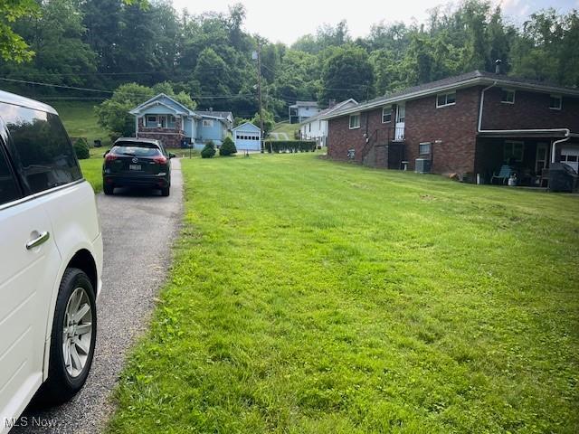525 W 39th St, Shadyside, OH 43947 - view of green lawn with driveway