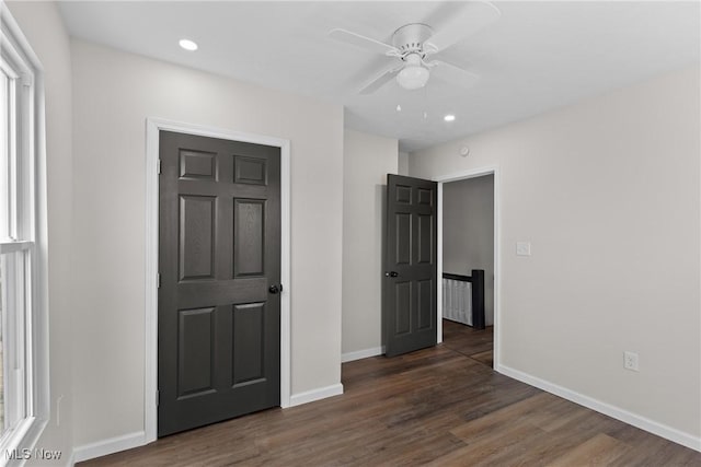 410 Elm St, Martins Ferry, OH 43935 - unfurnished bedroom featuring wood finished floors, recessed lighting, and a ceiling fan
