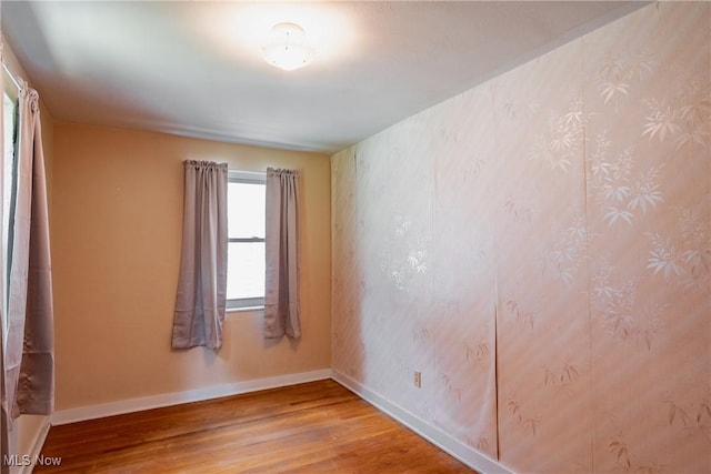 1713 26th St, Parkersburg, WV 26101 - unfurnished room with wood finished floors and baseboards