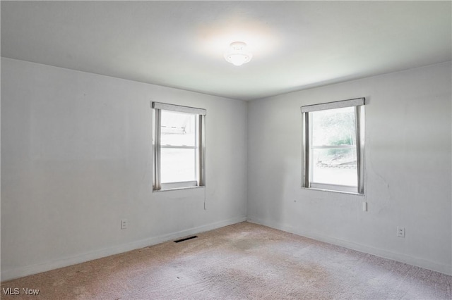 1713 26th St, Parkersburg, WV 26101 - carpeted empty room with baseboards