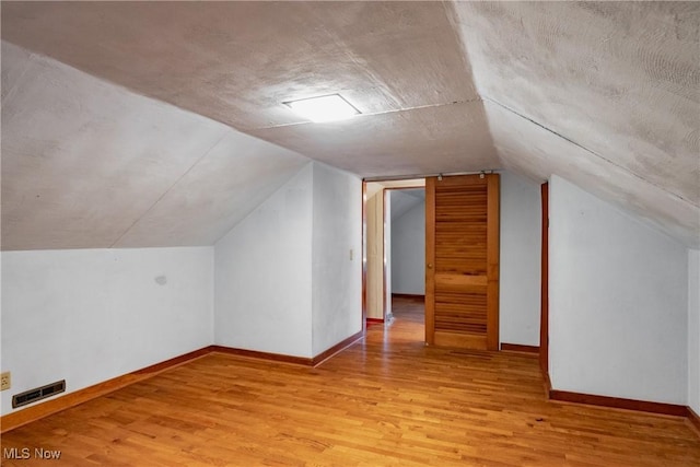 1713 26th St, Parkersburg, WV 26101 - bonus room with light wood-type flooring and lofted ceiling