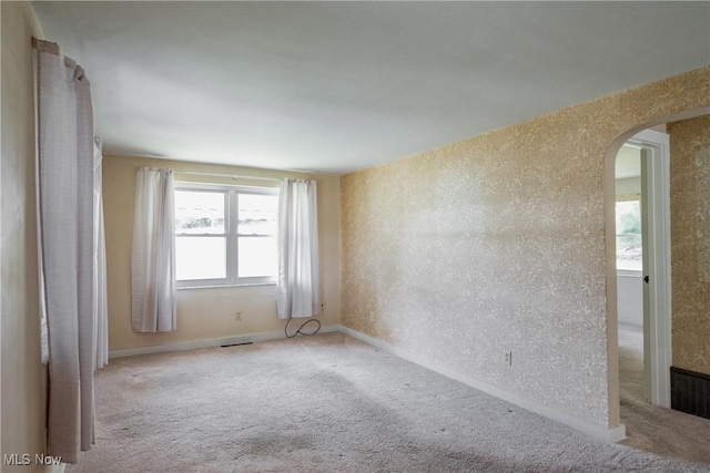 1713 26th St, Parkersburg, WV 26101 - carpeted empty room featuring arched walkways