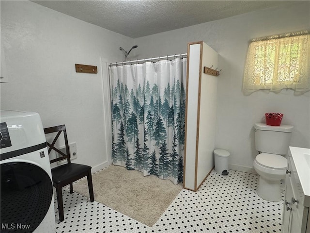 3028 Volcano Rd, Walker, WV 26180 - bathroom with washer / clothes dryer, vanity, curtained shower, and a textured ceiling