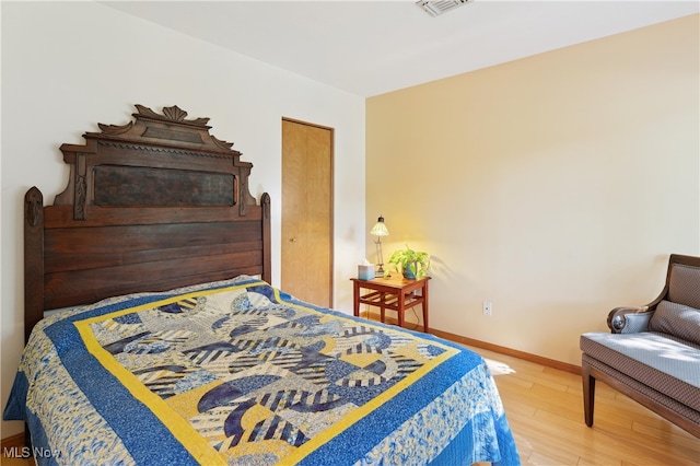 82 Pyle Rd, Oberlin, OH 44074 - bedroom featuring wood finished floors and baseboards