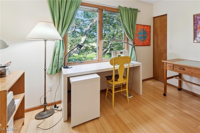 82 Pyle Rd, Oberlin, OH 44074 - office area featuring light wood-type flooring and built in desk