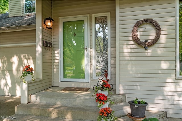 82 Pyle Rd, Oberlin, OH 44074 - entrance to property with a shingled roof and covered porch