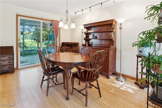 82 Pyle Rd, Oberlin, OH 44074 - dining space featuring light wood-type flooring and track lighting
