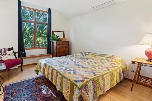 82 Pyle Rd, Oberlin, OH 44074 - bedroom featuring wood finished floors and vaulted ceiling