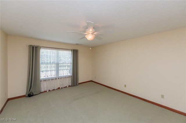 373 Chesapeake Cv, Painesville, OH 44077 - empty room featuring a ceiling fan and light carpet