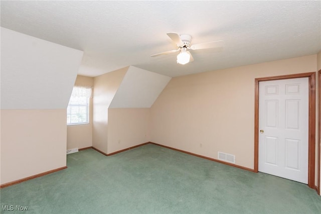 373 Chesapeake Cv, Painesville, OH 44077 - additional living space with carpet flooring, a ceiling fan, and lofted ceiling