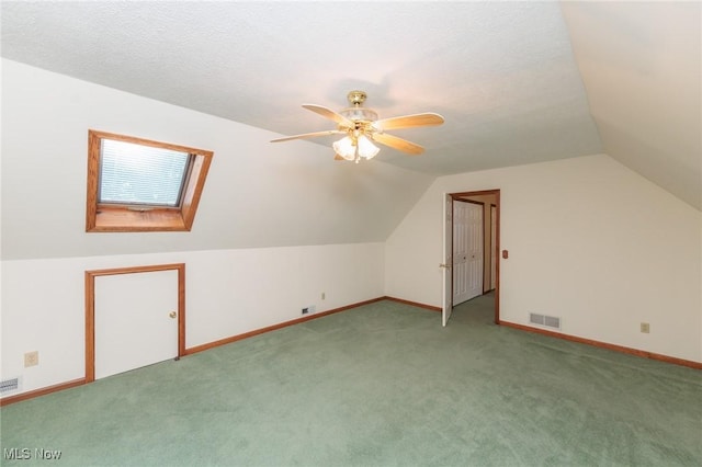 373 Chesapeake Cv, Painesville, OH 44077 - bonus room with light carpet, lofted ceiling, and a ceiling fan