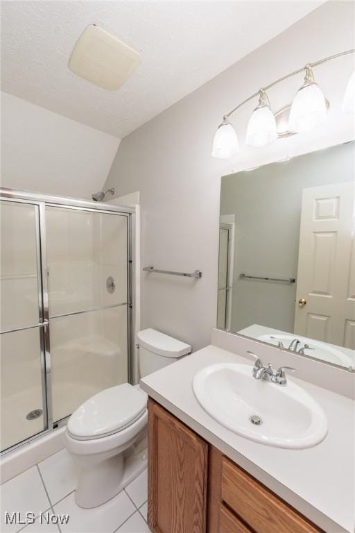 373 Chesapeake Cv, Painesville, OH 44077 - bathroom featuring vanity, lofted ceiling, a stall shower, and tile patterned floors